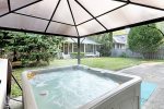 Sunsational hot tub in the backyard for your year round enjoyment